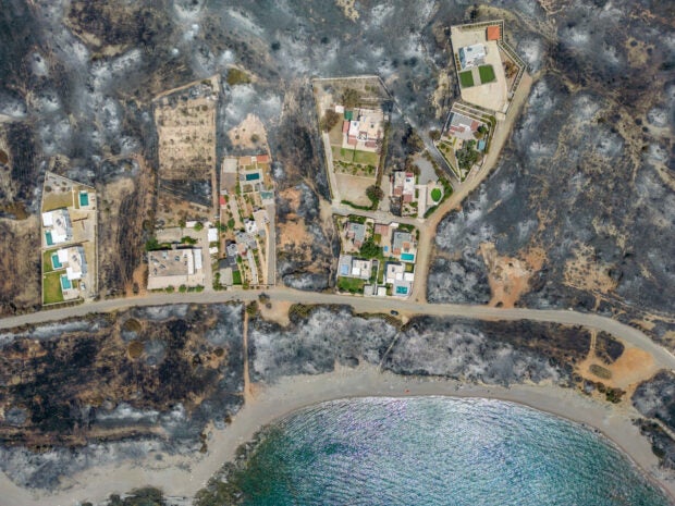 free holiday to tourists who fled Rhodes fires