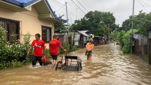 Floodwaters submerged roads and houses in several areas in this province and nearby Olongapo City due to incessant rains brought by the southwest monsoon which is now being strenghtened by severe tropical storm "Falcon" (international name: Khanun).